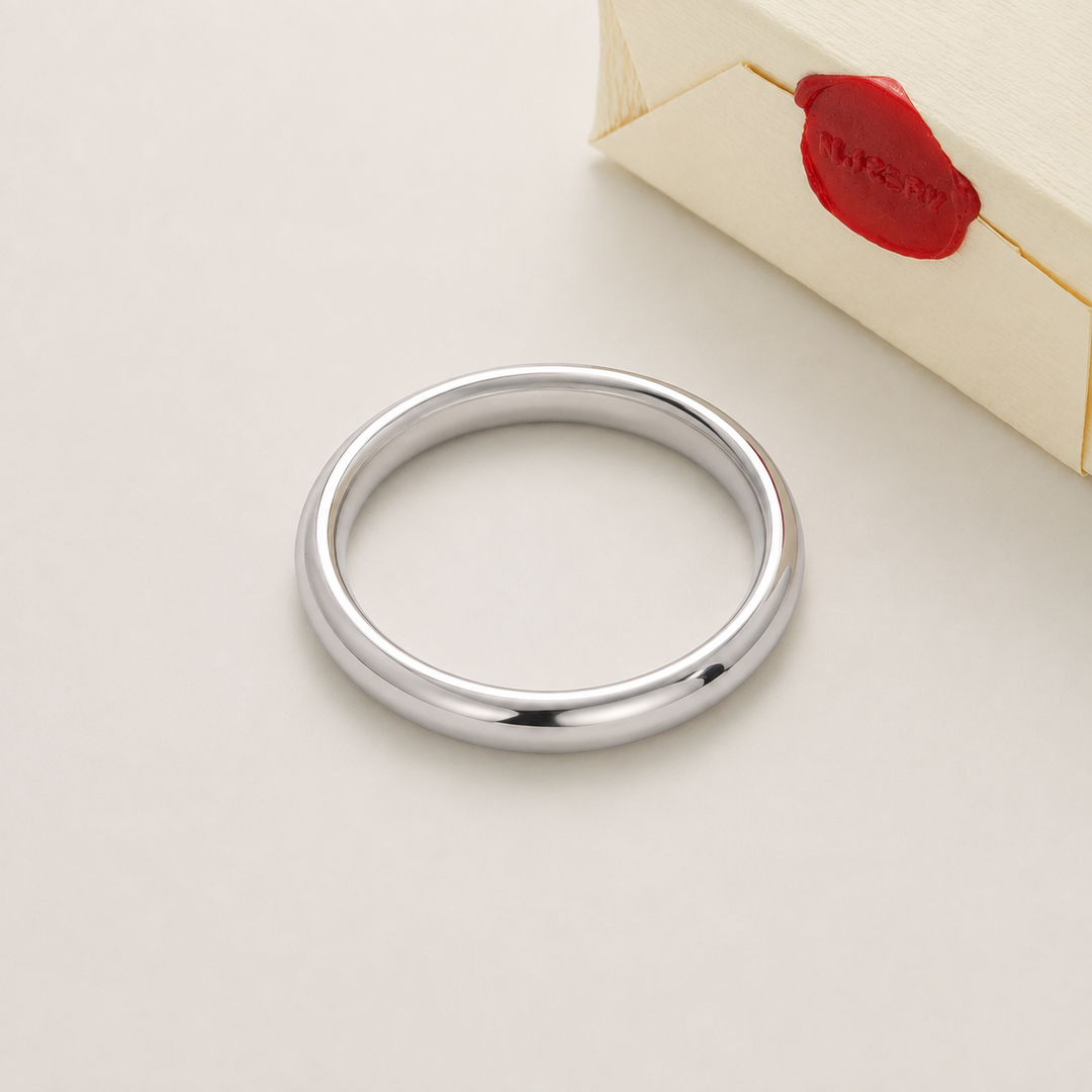 Silver bangle with Nucery wax seal packaging