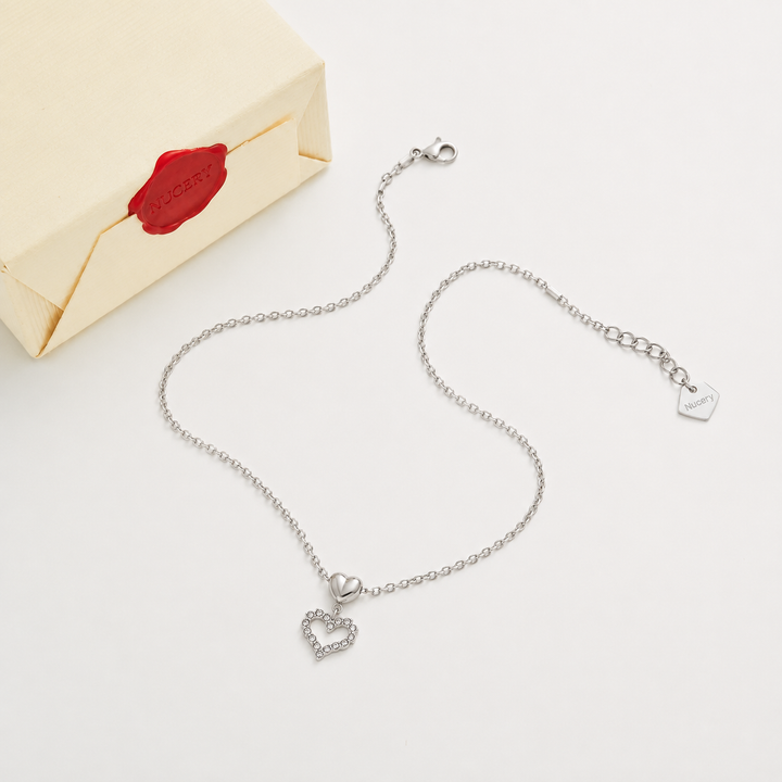Silver necklace with Nucery wax seal packaging