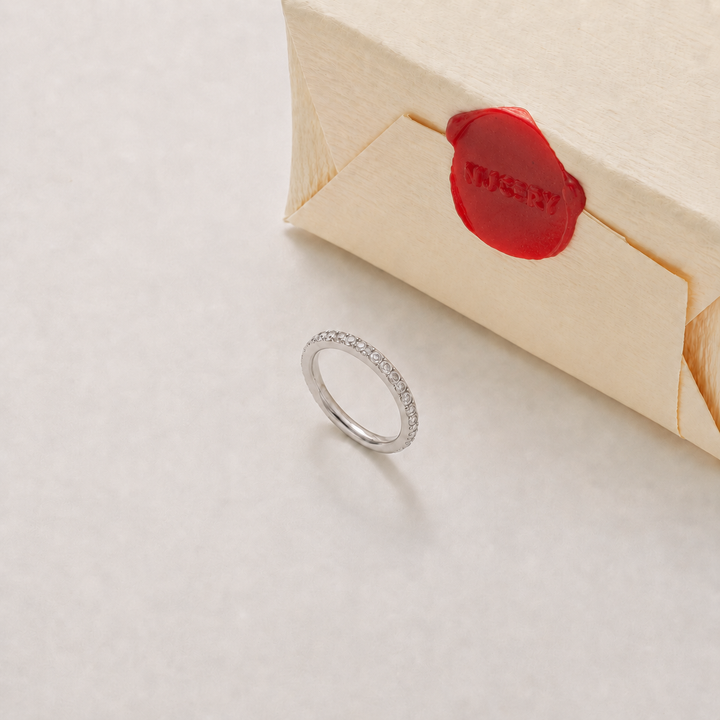 Silver ring with Nucery wax seal packaging