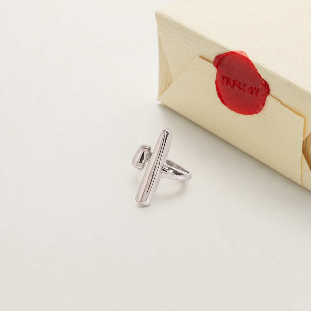 Silver ring with Nucery wax seal packaging