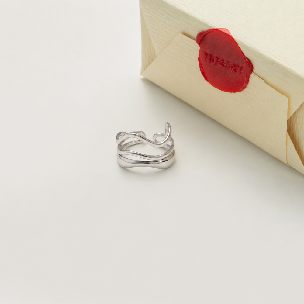 Silver ring with Nucery wax seal packaging