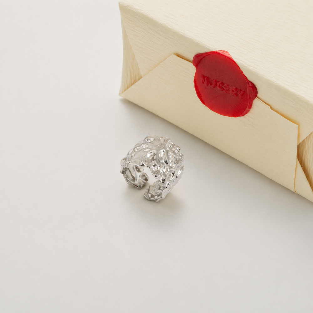 Silver ring with Nucery wax seal packaging