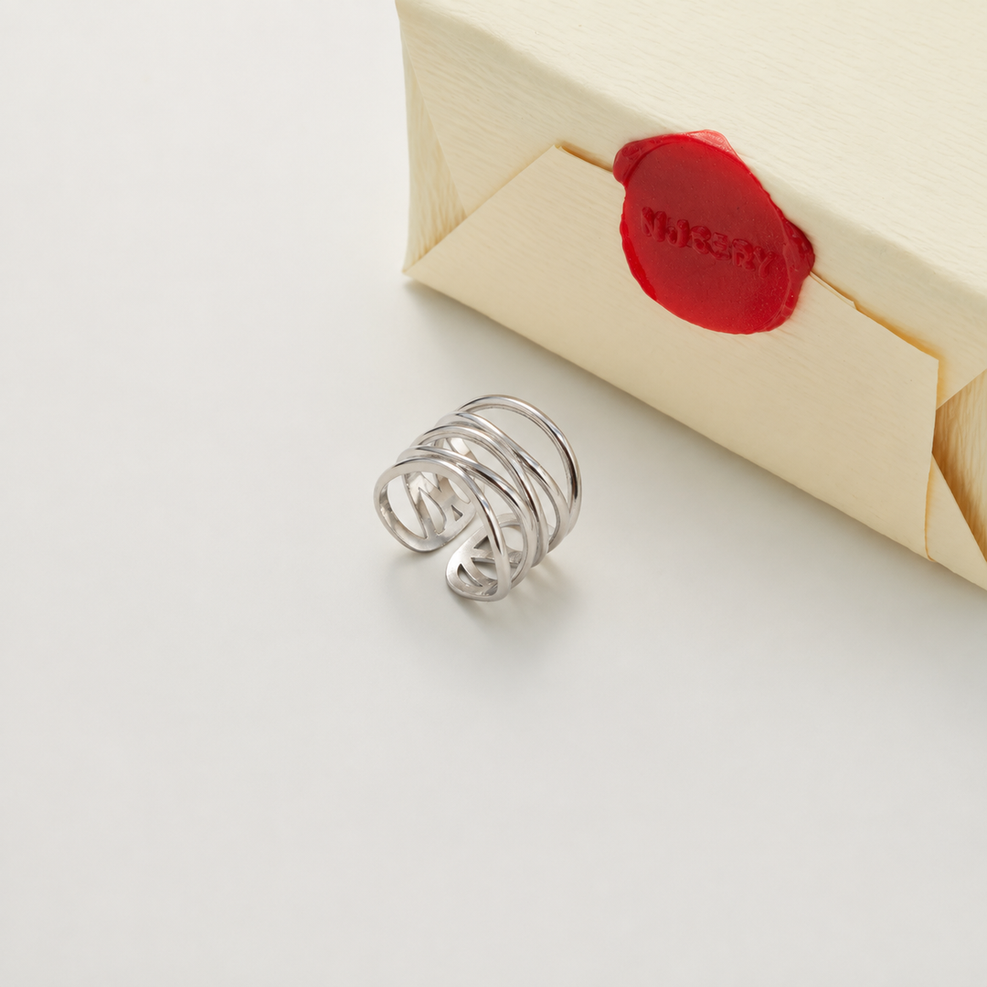 Silver ring with Nucery wax seal packaging
