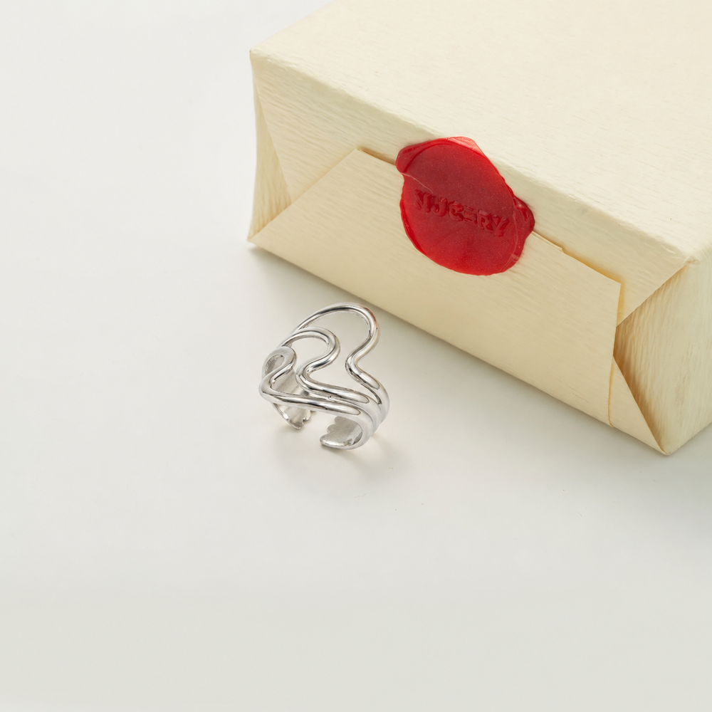 Silver ring with Nucery wax seal packaging