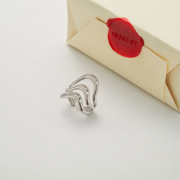 Silver ring with Nucery wax seal packaging