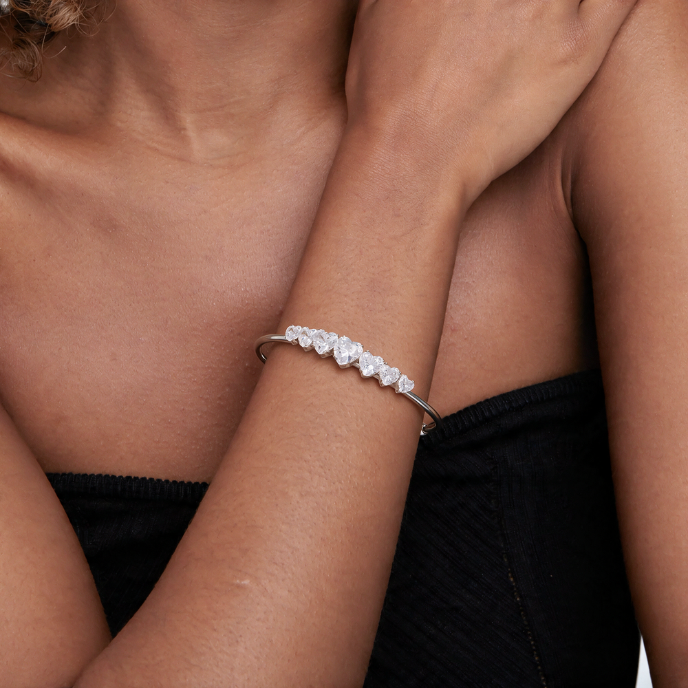 Silver bracelet worn on wrist
