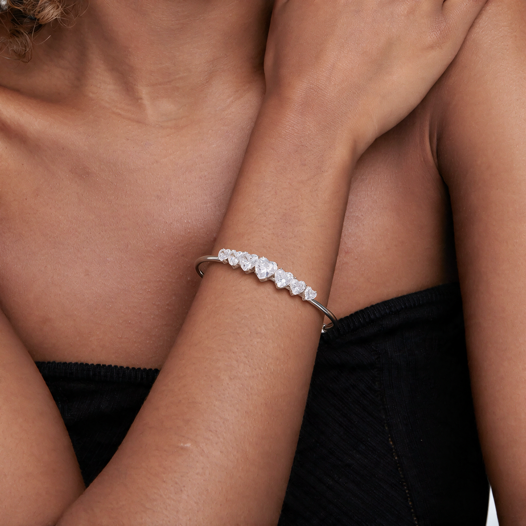 Silver bracelet worn on wrist
