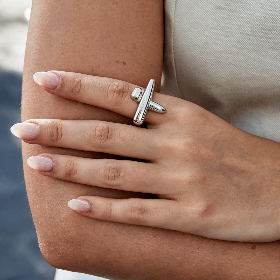 Silver bar statement ring worn on hand