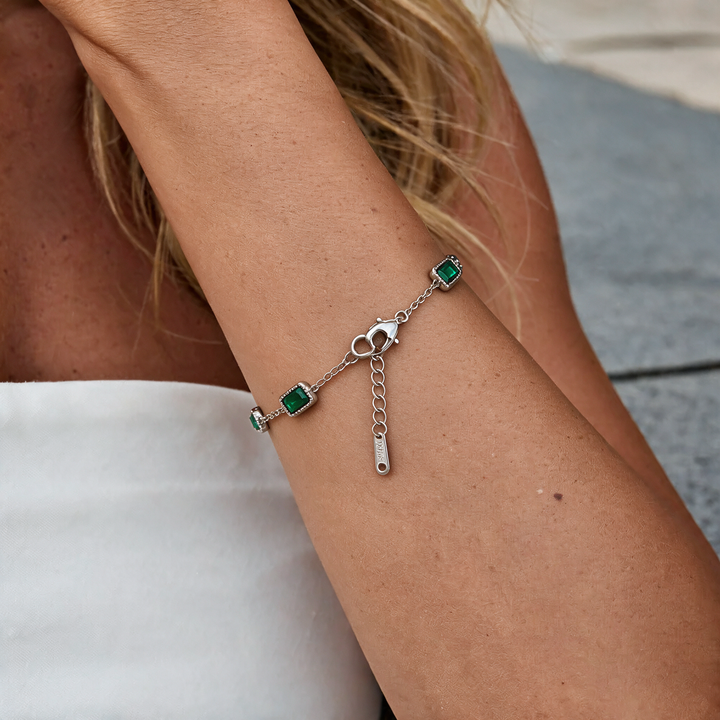 Silver bracelet worn on wrist