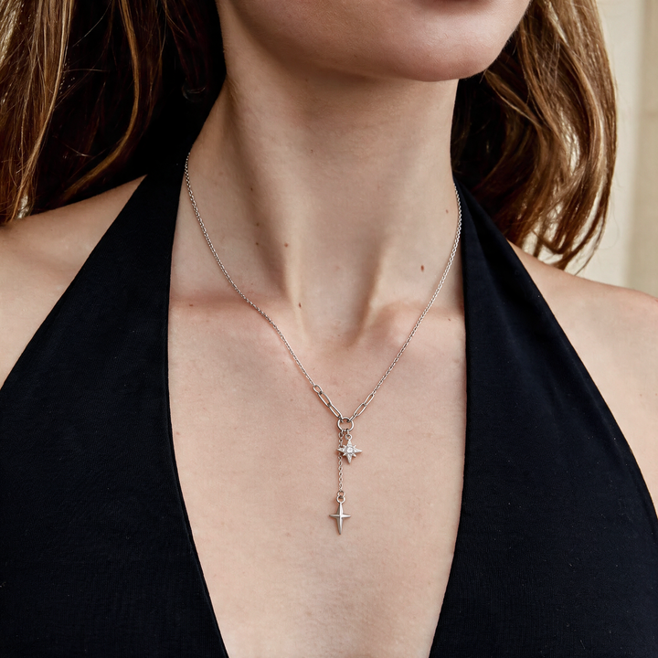 Silver necklace worn on neck